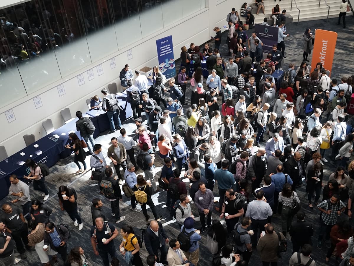 Guests mingling at a large community networking event