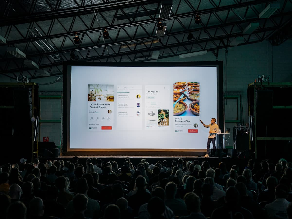 Audience watching a presentation at a corporate conference
